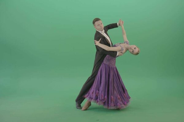 professional dancers performing ballroom dance on chroma key background