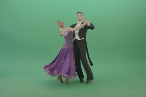 man and woman dancing ballroom dance on green screen video footage 4K