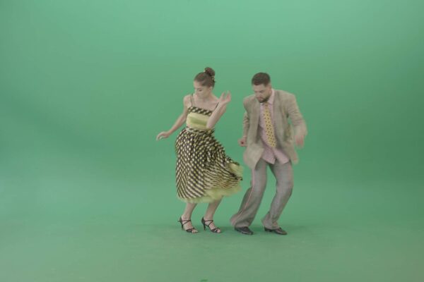 man and woman dancing jive on green screen video