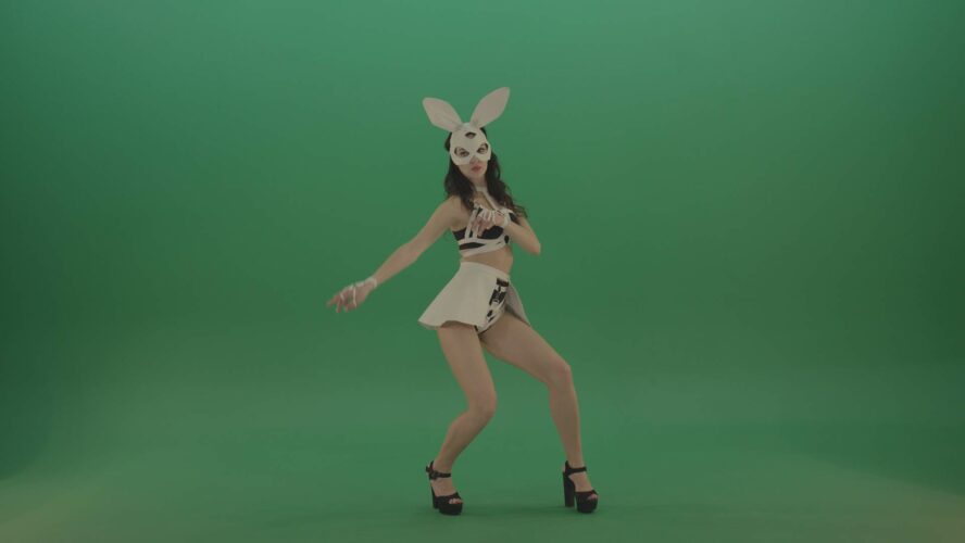 Girl in rabbit mask dancing on green screen video footage