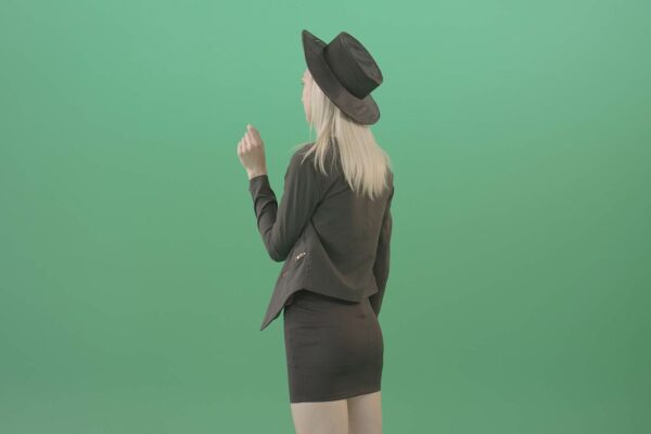 Girl-working-with-virtual-touch-screen-on-Green-Screen-Video-Footage-4K-Layer-3