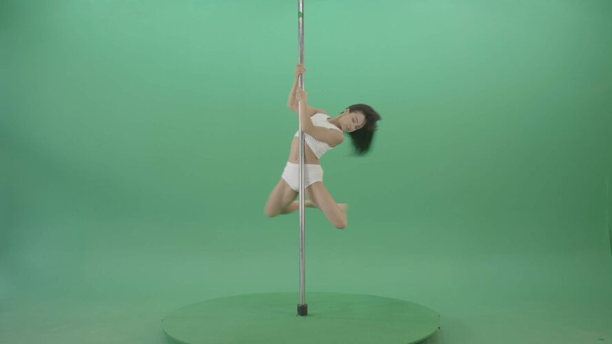 Pole dancing girl on green screen video footage in 4k